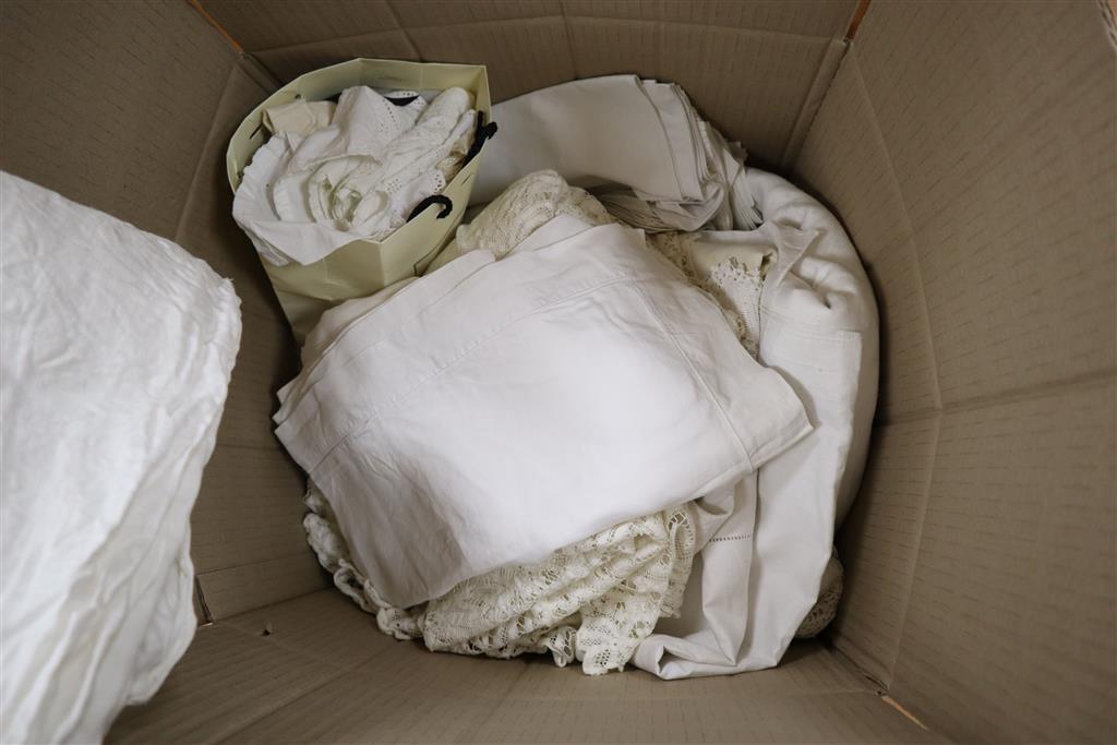 A quantity of assorted table linen, a lace cover, damask tablecloths, lace trimming, etc.